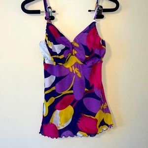 A multi colored tank top with adjustable straps